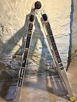 Side view of the gorilla ladder in an A-frame position showing aluminum construction and labels