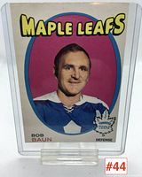 Front side image of 1970-71 Bob Baun Toronto Maple Leafs hockey card showing player portrait and team name.