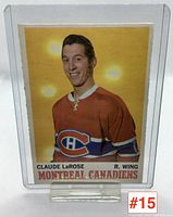 Front of hockey card with Claude LaRose in Montreal Canadiens uniform, in protective case.