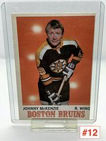 Front view of Johnny McKenzie Boston Bruins 1969-1970 hockey card showing player portrait and team name.