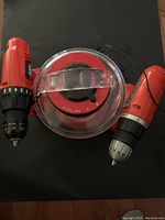 Top view showing the two Black and Decker drills and the GE lantern