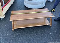 Photo showing the coffee table length measurement approximately 47 inches.