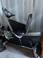Side view of Health Rider RC270 exercise bike showing seat, pedals, and console.