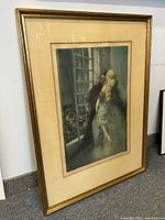 Full front view of framed etching showing image, mat, frame and glass