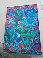 Full frontal view of painting showing stylized lady riding horse with floral background