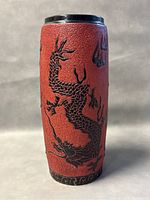 Front side view showing dragon details and textured orange background
