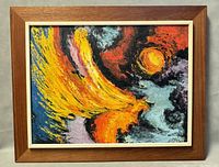 Front view of framed painting showing abstract composition with yellow, orange, red, blue, and black colors and signature Dallas bottom right.