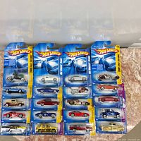 Front view of 20 Hot Wheels cars in original blister packaging, showing 2008 First Editions series cards.