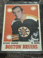 Front side of Kenny Hodge Boston Bruins hockey card showing player photo and team name.