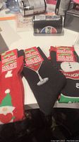 Photo showing three pairs of Christmas socks with holiday designs