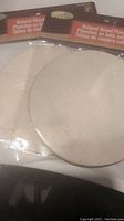 Two packages of natural wooden circle planks in original packaging, clearly showing the round shape and light wood color of the circles.