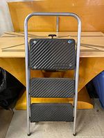 Front view of the 3ft Cosco step ladder showing three non-slip steps and handlebar.