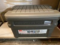 Front view of Rubbermaid Action Packer storage container showing the brand embossing and label details.