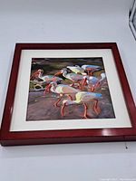 Frontal view of complete framed painting showing subject and frame