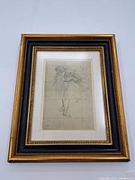 Full front view of framed lithograph