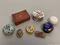 Overview of all eight assorted boxes arranged on table