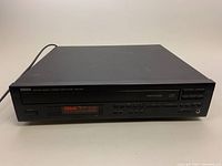 Front view showing Yamaha branding, model number CDC-845, disc tray, power button, and digital display with track information.