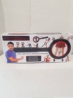 Closed box showing Party Scanner toy graphics and features including extendable light and magnifier for security fun.