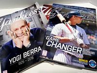 Photo shows six Yankees magazines fanned out with close up on Yogi Berra and Gary Sanchez covers