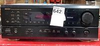 Front view of Denon stereo receiver with model and control buttons visible