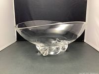 Front and side view of the clear crystal centerpiece bowl on sculpted supports.