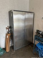 Full view of cabinet against wall showing overall appearance and condition