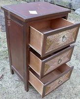 Solid wood 3-drawer cabinet with drawers open showing interior and bamboo front panels with textured inlay and ring pull handles.