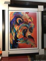 Full frontal view of framed painting