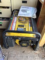 Front three-quarter view of generator and included manual