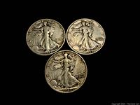 Three Walking Liberty half dollar coins showing obverse side with Lady Liberty design dated 1942, 1943, and 1944 respectively.