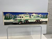 Photo of front of the original box featuring image of Hess gasoline tanker truck with helicopter on the back.