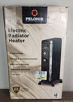 Box of the Pelonis electric radiator heater with brand, model number, features, and image of the heater on front.