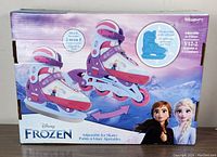 Box showing New Regent Disney Frozen 2-in-1 inline and ice skates, adjustable from sizes Y12 to 2.