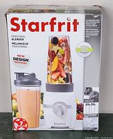 Front of box showing Starfrit personal blender with smoothie and fruits, indicating new design and 7-piece set.