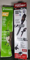 Greenworks 13-inch string trimmer and Hyper Tough 20V cordless power tool combo packaging boxes showing product details and features, damaged Greenworks box