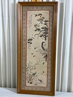 Full view of framed Japanese peacock print with birds and tree, vertical orientation.