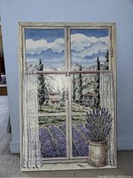 Front view of the wooden panel painting showing the window scene with lavender field, houses, and sky.