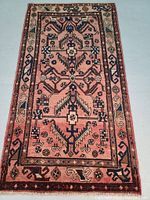 Full view of rug showing overall pattern and color.