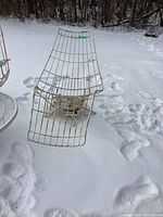 Side angle of lounge chair on snow