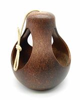 Front view showing the planter shape, cut-out openings on three sides, and attached hanging rope.