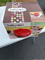 Original Babycakes packaging box showing the product and branding information.
