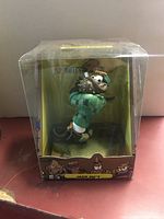 Front view of Jack Sh?T figurine in sealed original packaging showing detailed character design.