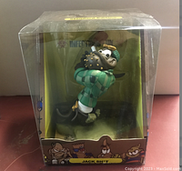 Front view of Jack Sh?T figurine in clear display box with character artwork and branding.