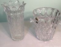Photo showing both the tall vase and ice bucket side by side on a white surface.