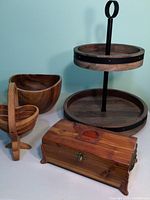 Photo showing all four items together: the heart hanging bowl, large wooden bowl, double lazy Susan, and cedar box