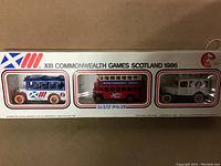 Front view of sealed boxset containing three diecast vehicles commemorating 1986 Commonwealth Games.