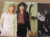 Cover photo of Cheap Trick's Heaven Tonight album front showing two band members