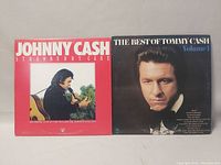Front covers of Johnny Cash Strawberry Cake and The Best of Tommy Cash Volume 1 albums showing cover art and titles.