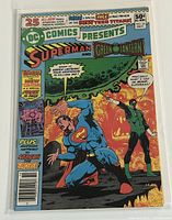 Clear front photo of the comic book cover featuring Superman and Green Lantern with visible text and artwork.