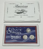 White outer sleeve with 'American Coin Treasures Genuine Coin Collection' label